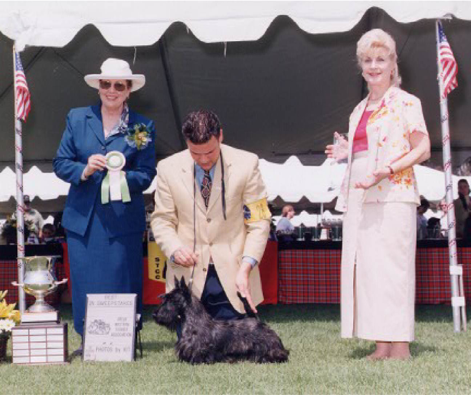 Awards Ceremony with dog and its owner.